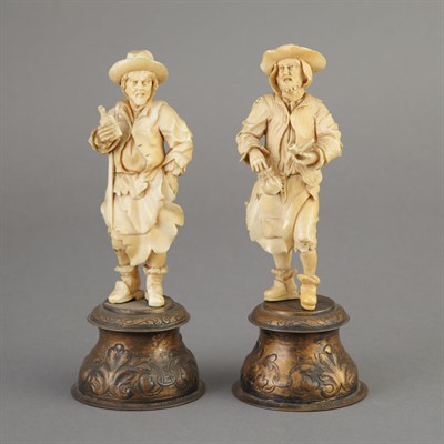 Lot 727 - Pair of German Carved Ivory Figures of Peasant...