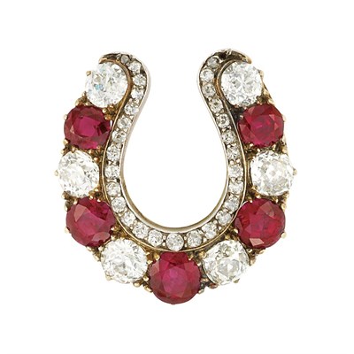 Lot 305 - Antique Silver, Gold, Ruby and Diamond Horseshoe Pin