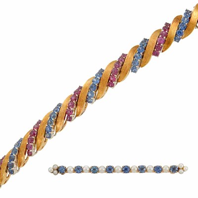 Lot 521 - Two-Color Gold, Ruby and Sapphire Bracelet