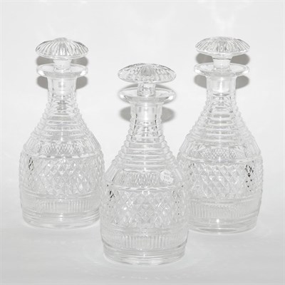 Lot 370 - Set of Three Georgian Style Glass Decanters...