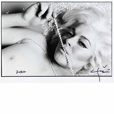 Lot 750 - STERN, BERT (1929-2013) Lindsay Lohan with...