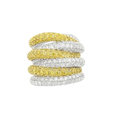 Lot 228 - Wide White Gold, Diamond and Fancy Colored Yellow Diamond Band Ring