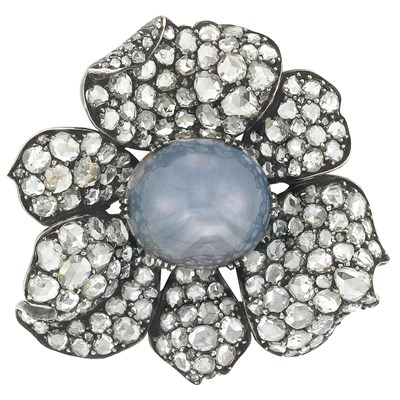 Lot 94 - Blackened Silver, Star Sapphire and Diamond Flower Brooch