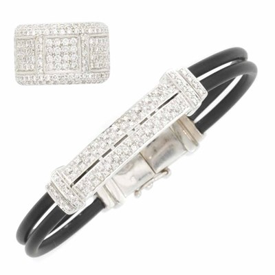 Lot 210 - White Gold and Diamond Band Ring and Diamond and Rubber Cord Bracelet
