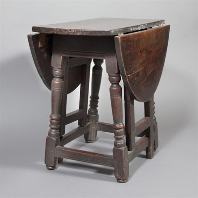 Lot 373 - English Walnut and Oak Drop-Leaf Table...