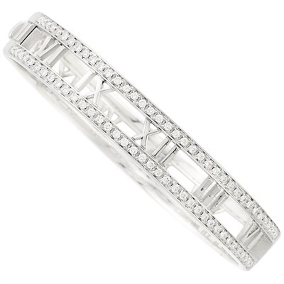 Lot 77 - White Gold and Diamond 'Atlas' Bangle Bracelet, Tiffany & Co.