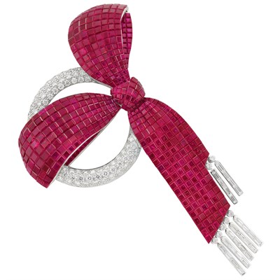 Lot 329 - White Gold, Invisibly-Set Ruby and Diamond Circle Bow Brooch