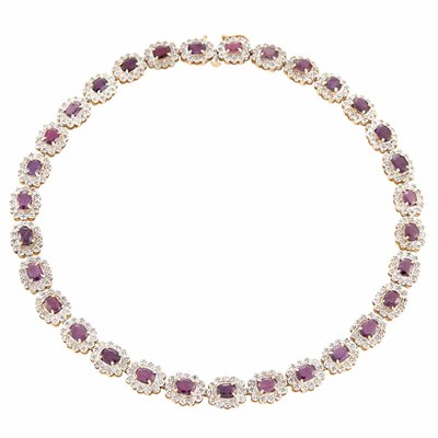 Lot 794 - Two-Color Gold, Ruby and Diamond Necklace
