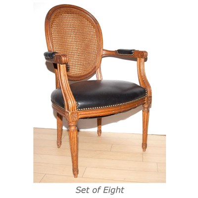 Lot 531 - Set of Eight Louis XVI Style Caned and Walnut...