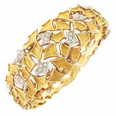Lot 299 - Two-Color Gold and Diamond Bangle Bracelet
