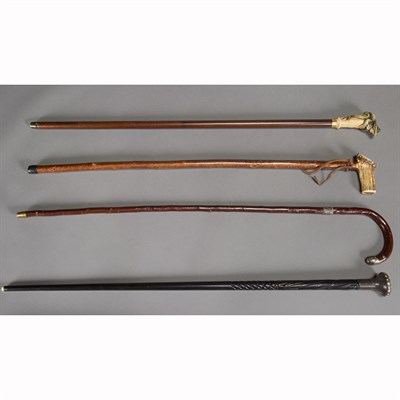 Lot 618 - Group of Four Walking Sticks
