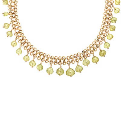 Lot 658 - Gold and Peridot Briolette Fringe Necklace