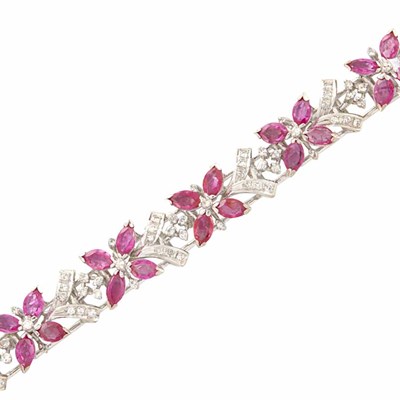 Lot 630 - White Gold, Ruby and Diamond Bracelet