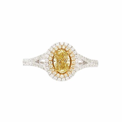 Lot 907 - Yellow Diamond and Diamond Ring