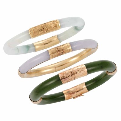 Lot 327 - Three Gold, Nephrite, Jade and Lavendar Jade Bangle Bracelets