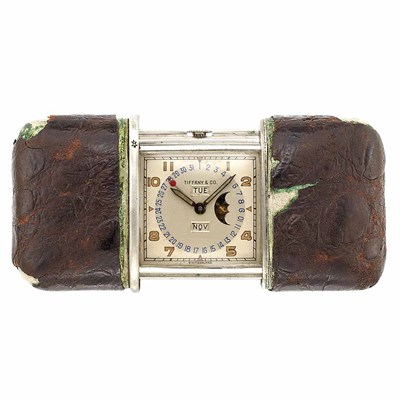 Lot 419 - Silver, Metal and Leather Moonphase 'Ermeto' Travel Clock, Tiffany & Co., Movado