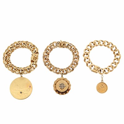 Lot 523 - Three Gold Charm Bracelets
