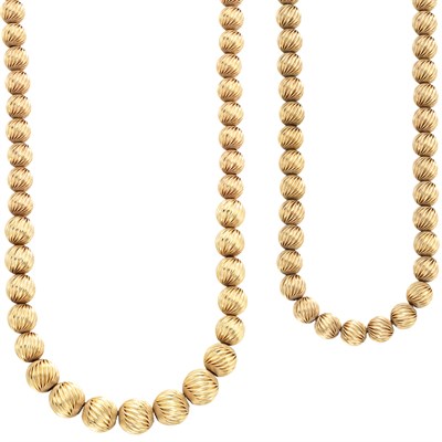Lot 542 - Two Fluted Gold Bead Necklaces