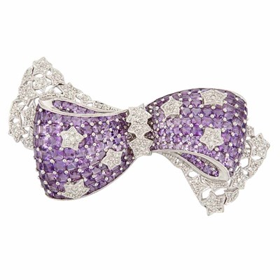 Lot 618 - White Gold, Amethyst and Diamond Bow Brooch