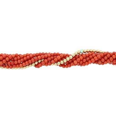 Lot 638 - Eight Strand Coral and Gold Bead Torsade Bracelet