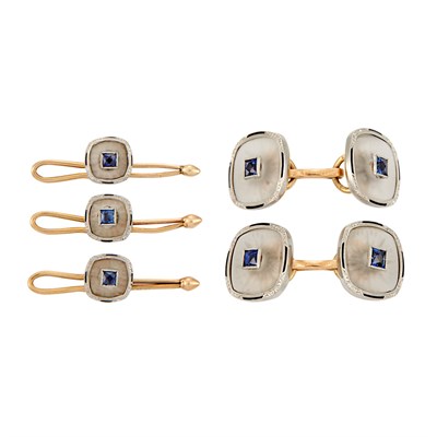 Lot 178 - Pair of Two-Color Gold, Carved Frosted Rock Crystal, Sapphire and Black Enamel Dress Set
