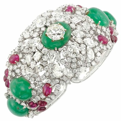 Lot 383 - Platinum, Diamond, Emerald Bead, Cabochon Emerald and Ruby Cuff Bangle Bracelet