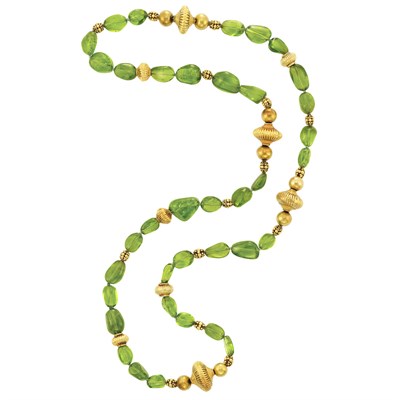 Lot 268 - Gold and Tumbled Peridot Bead Necklace