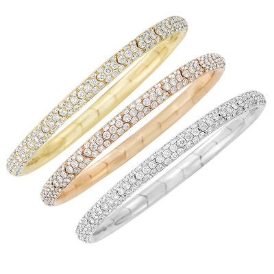 Lot 175 - Three Tricolor Gold and Diamond Bangle Bracelets