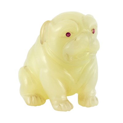 Lot 316 - Carved Bowenite and Ruby Pug Desk Objet