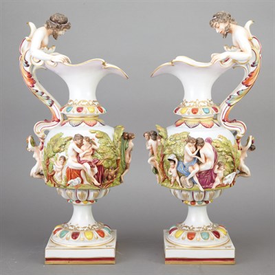 Lot 134 - Companion Pair of Capodimonte Porcelain Ewers...