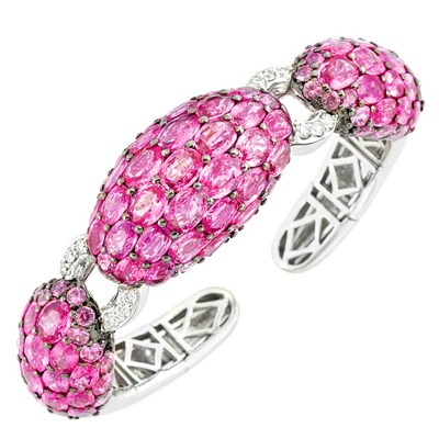Lot 155 - White Gold, Pink Sapphire and Diamond Bangle Bracelet