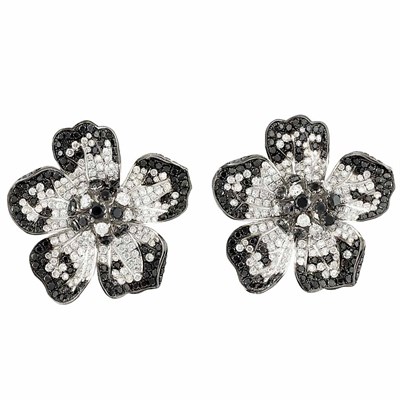 Lot 130 - Pair of White Gold, Diamond and Black Diamond Flower Earrings