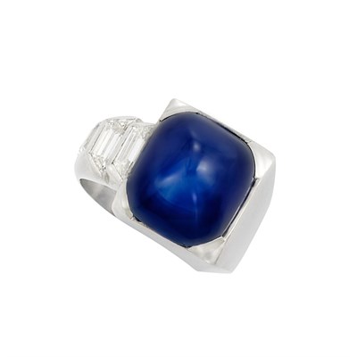 Lot 399 - Platinum, Cabochon Sapphire and Diamond Ring