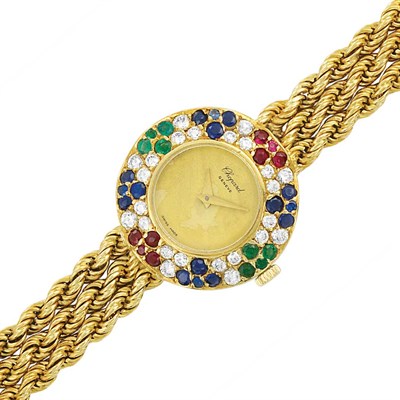 Lot 234 - Triple Strand Gold, Diamond and Gem-Set Bracelet-Watch, Chopard