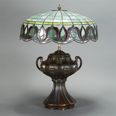 Lot 539 - American Patinated-Metal and Leaded Glass Lamp...