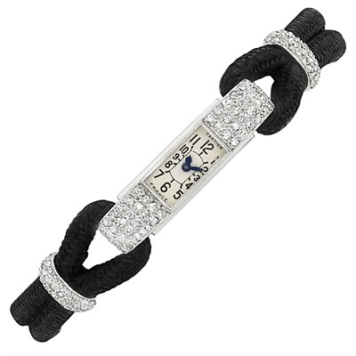 Lot 117 - Art Deco Platinum, Gold, Diamond, Black Enamel and Cord 'Baguette' Wristwatch, Cartier, France, European Watch & Clock Co., Inc.