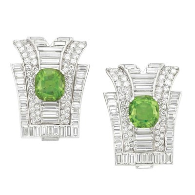 Lot 361 - Pair of Platinum, Peridot and Diamond Clips, Cartier, London, with Gold Bangle Attachment
