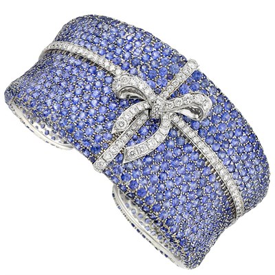 Lot 215 - White Gold, Sapphire and Diamond Cuff Bangle Bracelet