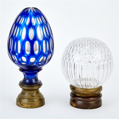 Lot 529 - Two Glass Newel Post Finials Height of larger...