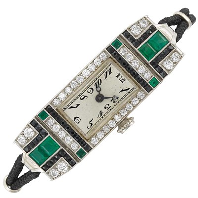 Lot 411 - Art Deco Platinum, Emerald, Diamond and Black Onyx and Black Cord Wristwatch