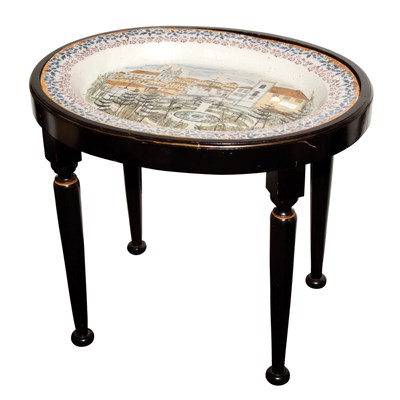 Lot 394 - Landscape Decorated Faience Oval Platter on a...