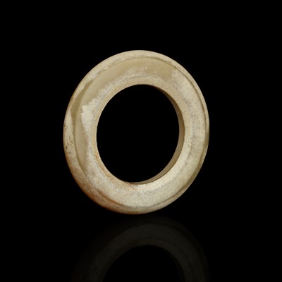 Lot 76 - Chinese Archaic Jade Ring Western Zhou Dynasty...
