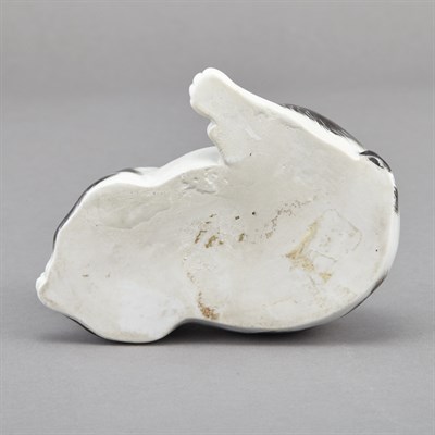 Lot 21 - Japanese Black and White Glazed Porcelain Dog...