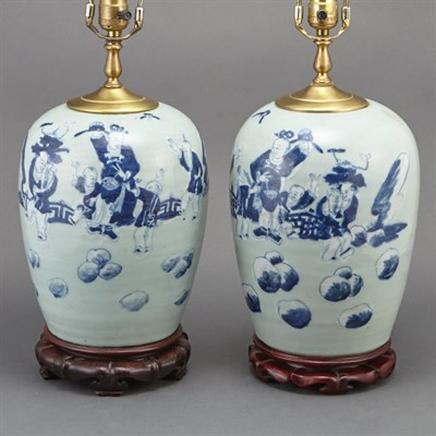 Lot 120 - Pair of Chinese Blue, White and Celadon Glazed...