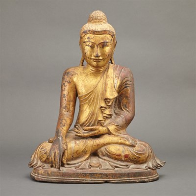 Lot 379 - Southeast Asian Gilt-Bronze Figure of a Seated...