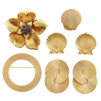 Lot 1406 - Pair of Gold Shell Earclips, Tie Tac, Circle Pin, Pair of Clip-Brooches, and Gold and Sapphire Flower Brooch