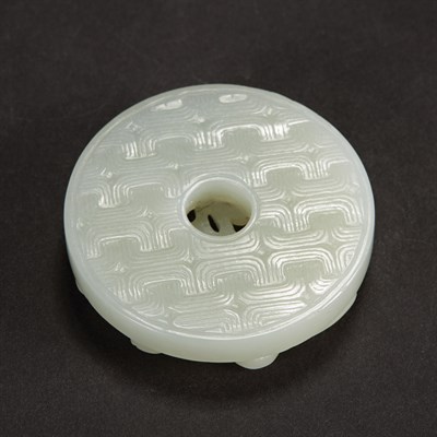 Lot 327 - Chinese White Jade Bi Carved in deep relief...