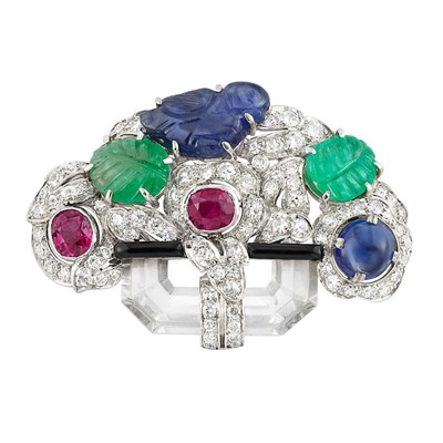 Lot 429 - Art Deco Platinum, Diamond, Rock Crystal, Gem-Set, Carved Colored Stone and Black Enamel 'Tutti Frutti' Clip-Brooch, Ellis Bros.