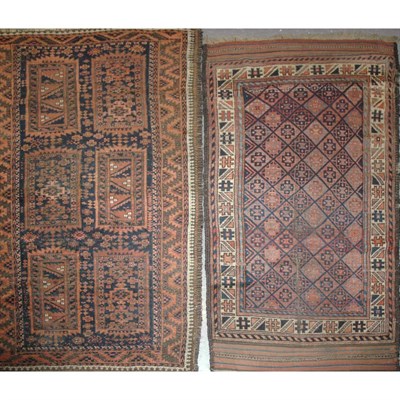 Lot 251 - Group of Four Belouch Rugs West Turkestan,...