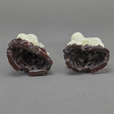 Lot 220 - Two Similar Chinese Celadon Jade Figures of...